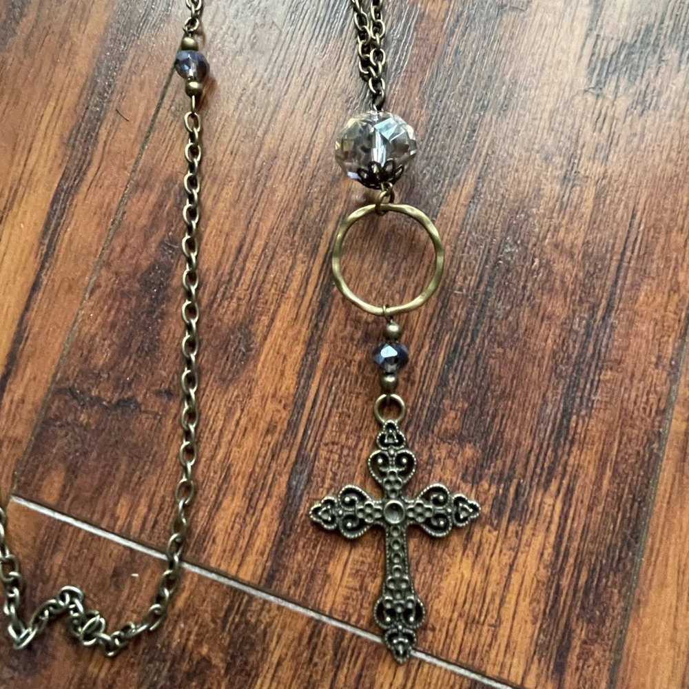 Super cute adjustable small cross necklace. Handmade in Tennessee